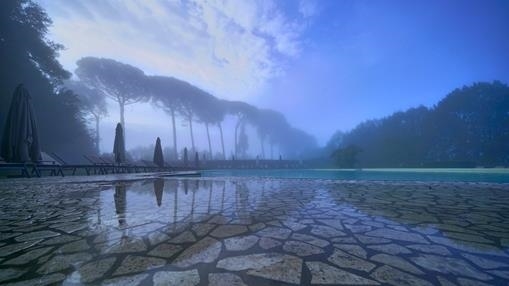 Swimming pool in Tuscany, Italy one autumn morning.